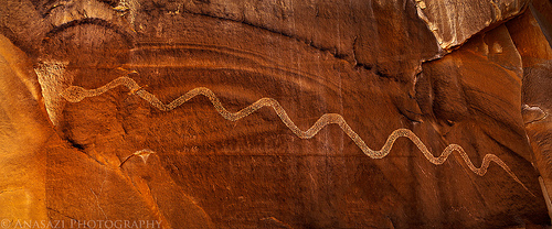 Solstice Snake rock carving